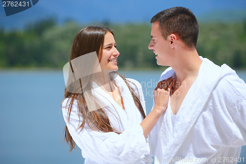 Image of young couple on yacht