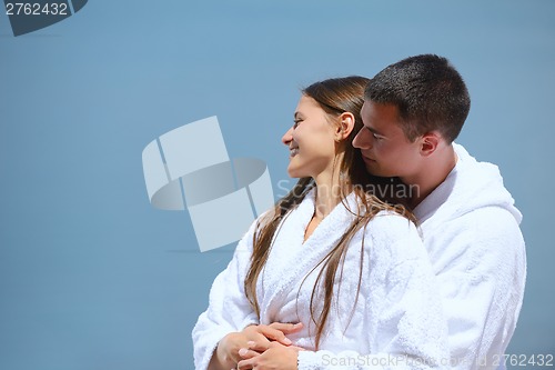 Image of young couple on yacht