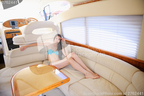 Image of young couple on yacht