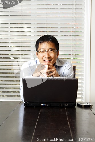 Image of Working businessman