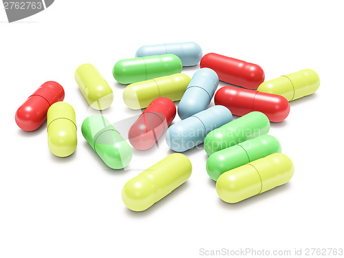 Image of Many colored pills on white