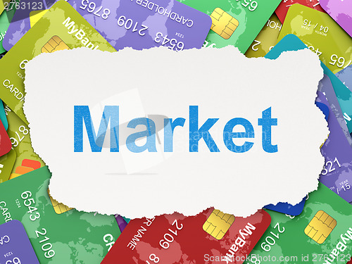 Image of Torn paper with words Market on credit card background