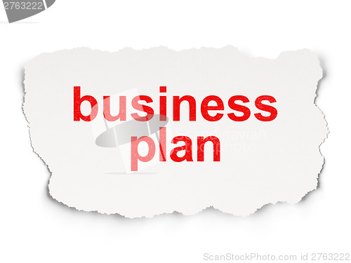 Image of Torn paper with words business plan on  background