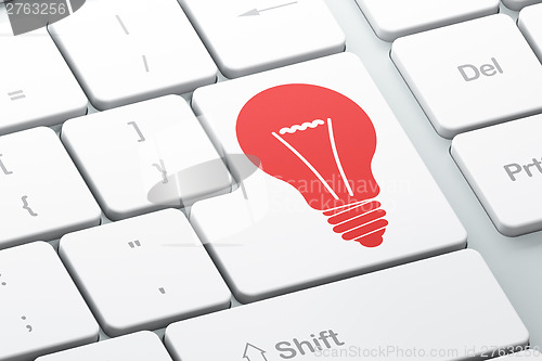 Image of Business concept: computer keyboard with Light Bulb