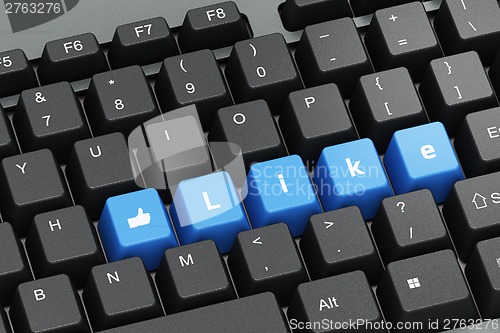 Image of Black keyboard with blue Like buttons