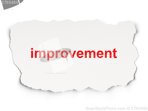 Image of Torn paper with words improvement on  background