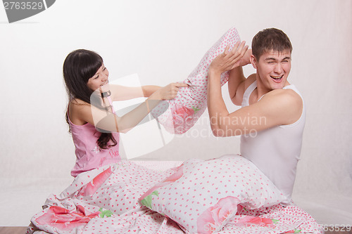 Image of The guy is protected from hitting the pillow