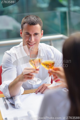 Image of couple having lanch at beautiful restaurant
