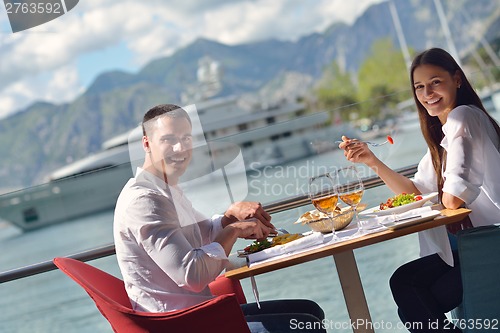 Image of couple having lanch at beautiful restaurant