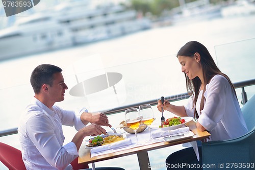 Image of couple having lanch at beautiful restaurant