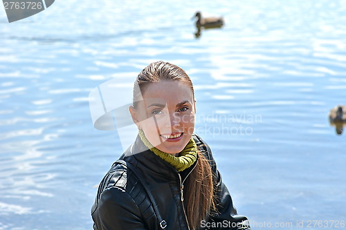 Image of Woman against lake