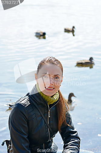 Image of Woman against lake