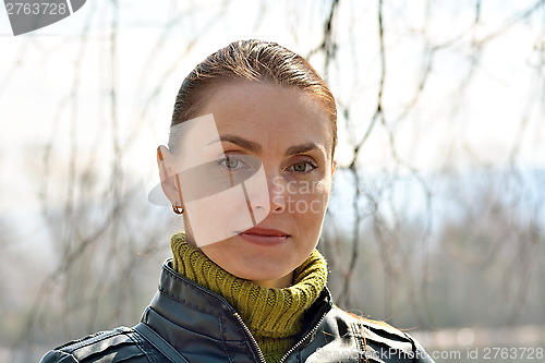 Image of Portrait of a beautiful woman in nature