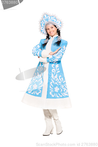 Image of Playful brunette posing in snow maiden costume