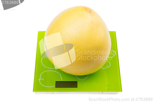 Image of Pomelo fruit on square scales