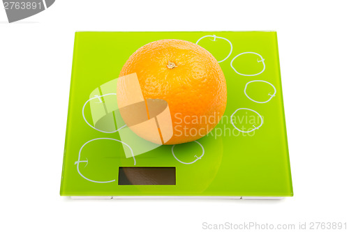 Image of Sweet orange on scales