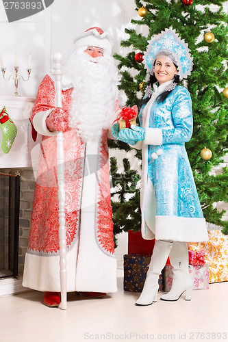 Image of Snow maiden and santa claus