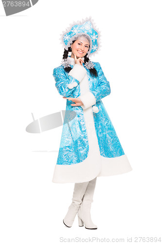 Image of Cheerful brunette posing in winter costume