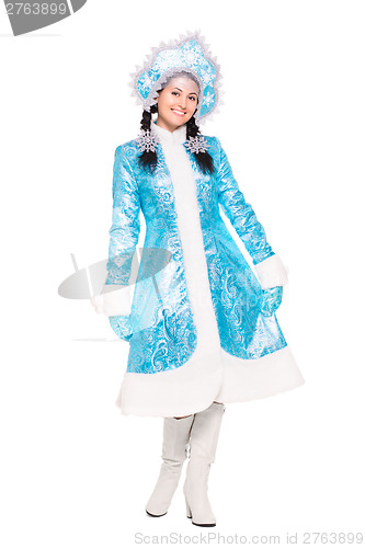 Image of Young brunette posing in winter costume