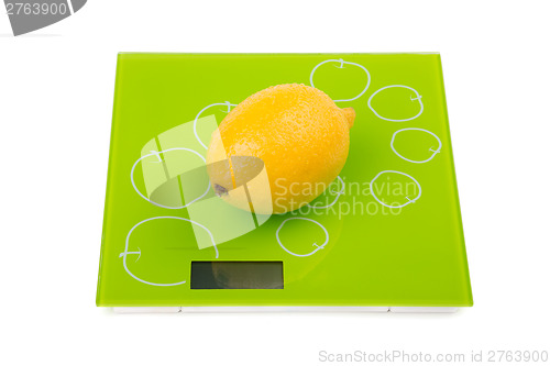 Image of Yellow lemon on square scales