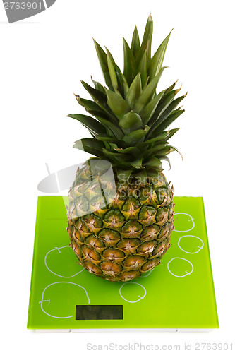 Image of Pineapple on square kitchen scales