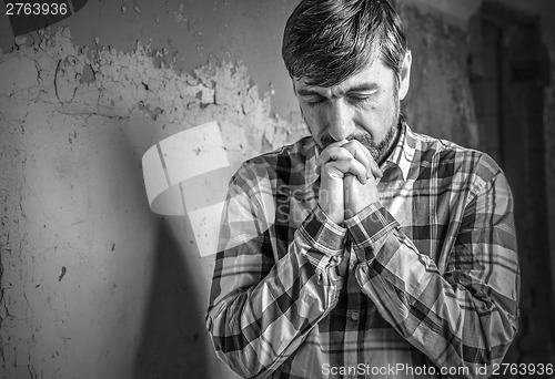 Image of man praying