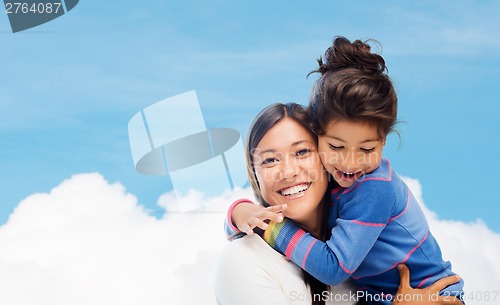 Image of hugging mother and daughter