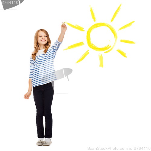 Image of girl drawing big sun in the air
