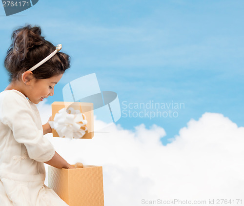 Image of happy child girl with gift box