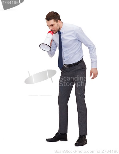 Image of angry businessman with megaphone