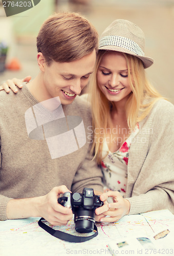 Image of couple with photo camera