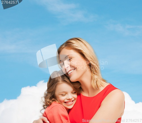 Image of hugging mother and daughter