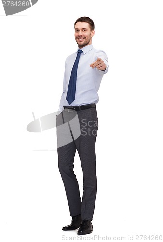 Image of handsome buisnessman pointing finger at you