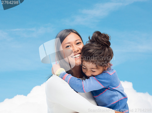 Image of hugging mother and daughter