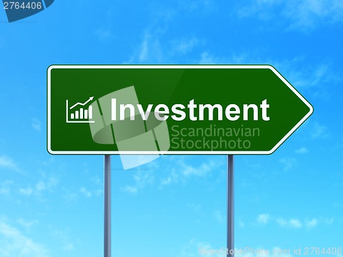 Image of Finance concept: Investment and Growth Graph on road sign background