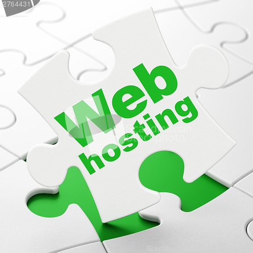 Image of Web development concept: Web Hosting on puzzle background