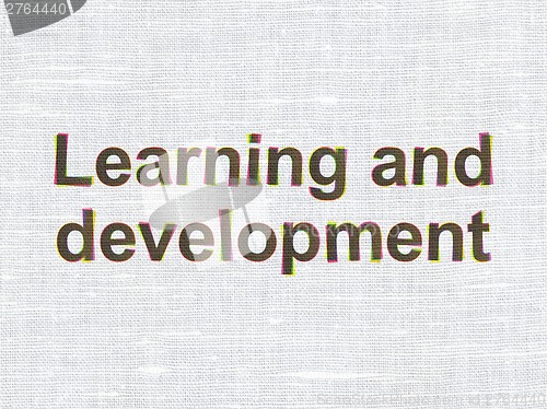 Image of Education concept: Learning And Development on fabric texture background