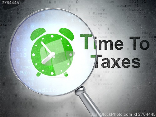 Image of Timeline concept: Alarm Clock and Time To Taxes with optical glass