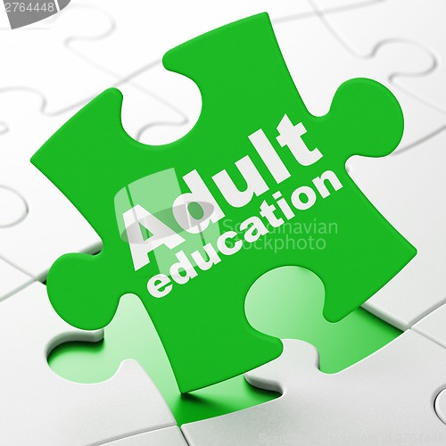 Image of Education concept: Adult Education on puzzle background