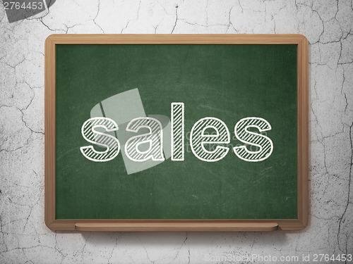 Image of Advertising concept: Sales on chalkboard background