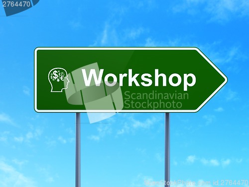 Image of Education concept: Workshop and Head With Finance Symbol on road sign background