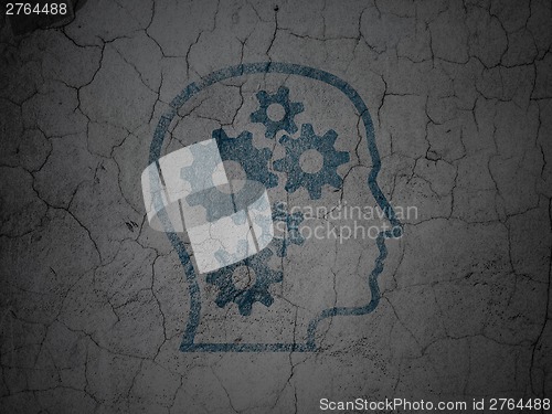 Image of Data concept: Head With Gears on grunge wall background