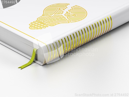 Image of Business concept: closed book, Light Bulb on white background
