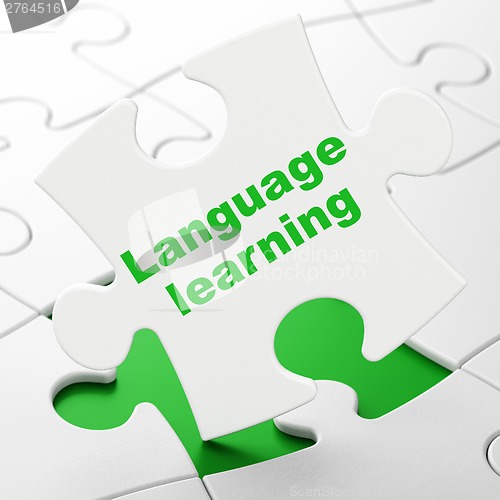 Image of Education concept: Language Learning on puzzle background