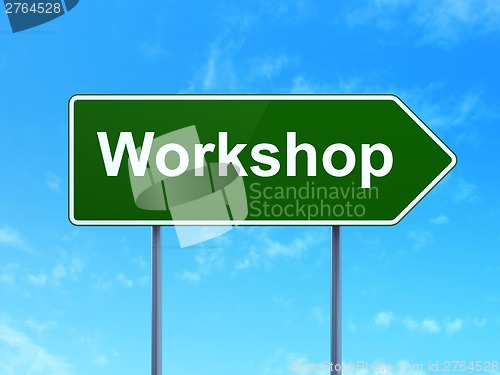Image of Education concept: Workshop on road sign background
