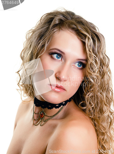 Image of portrait of a beautiful young girl with long blond wavy hair