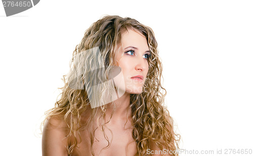 Image of portrait of a beautiful young girl with long blond wavy hair