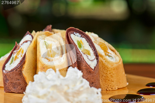 Image of pancake roll with marmalade