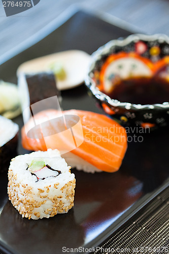 Image of Sushi plate with soy sauce