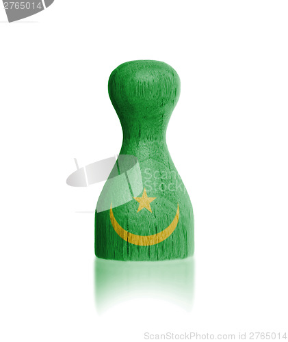 Image of Wooden pawn with a flag painting